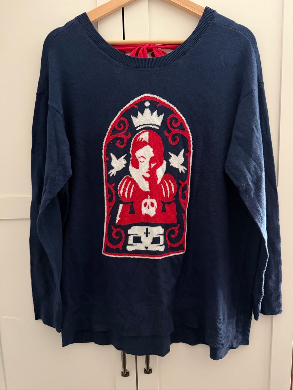 torrid Disney Snow Write navy sweater with red ribbon back tie
